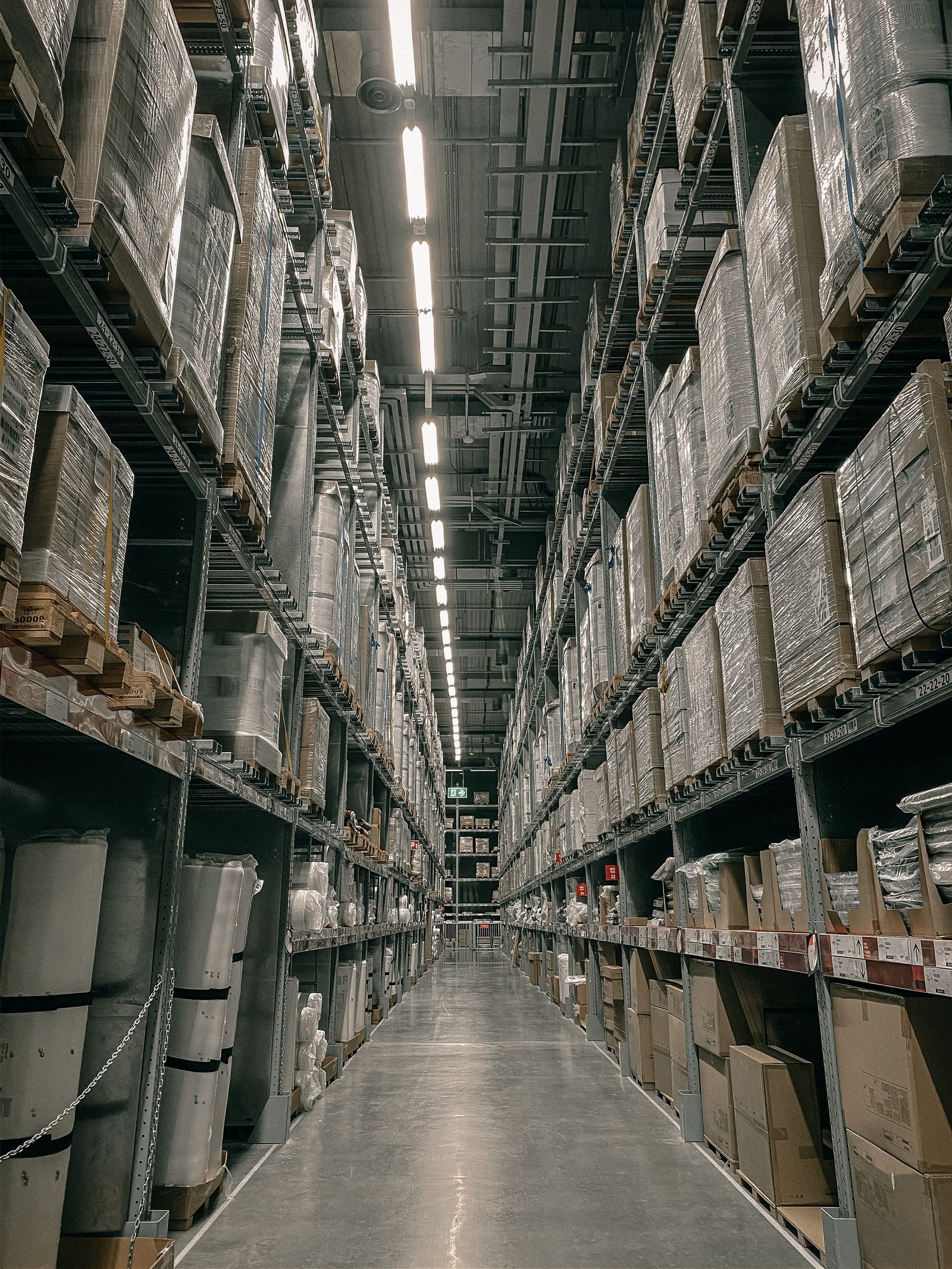 Shelving along a warehouse parts aisle.